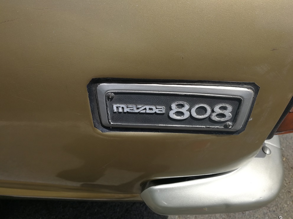 Mazda 808 badge